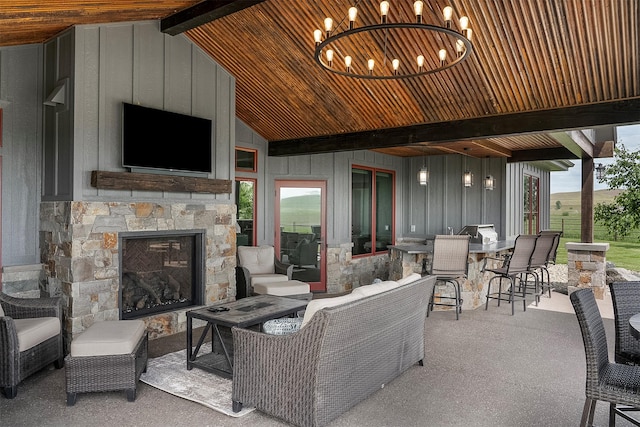 45331 Turnquist Rd, Ronan, MT 59864 - view of patio / terrace featuring an outdoor living space with a fireplace