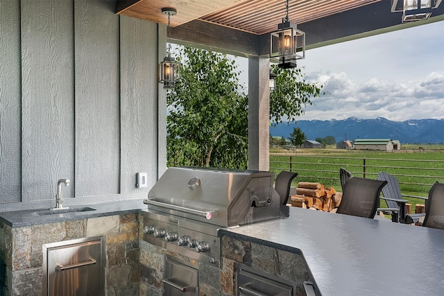 45331 Turnquist Rd, Ronan, MT 59864 - view of patio / terrace featuring a sink and a mountain view
