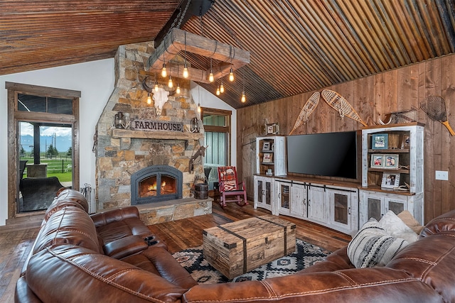 45331 Turnquist Rd, Ronan, MT 59864 - living room with wood walls, hardwood / wood-style flooring, a fireplace, high vaulted ceiling, and wood ceiling