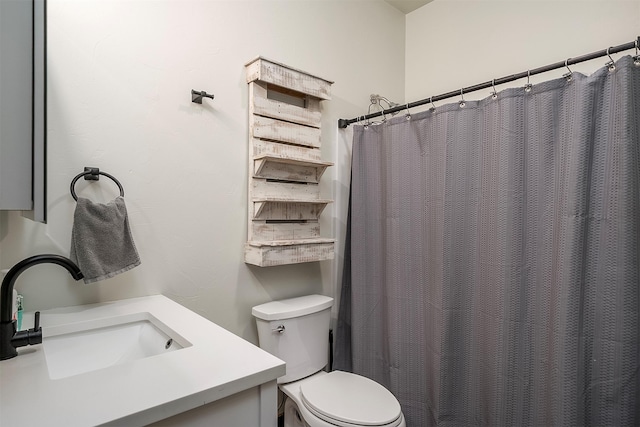 45331 Turnquist Rd, Ronan, MT 59864 - full bath featuring vanity, toilet, and a shower with shower curtain
