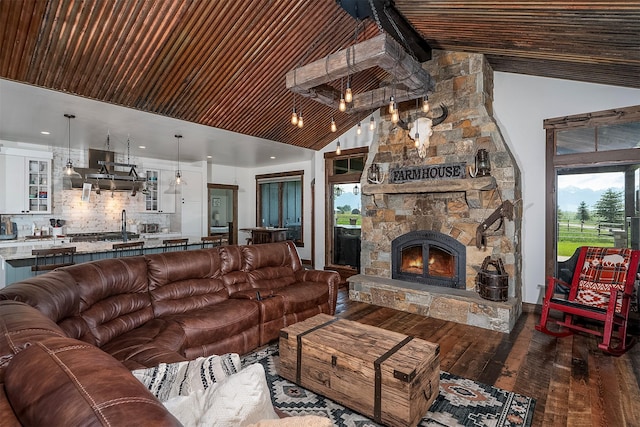 45331 Turnquist Rd, Ronan, MT 59864 - living area with wooden ceiling, hardwood / wood-style floors, a fireplace, and high vaulted ceiling