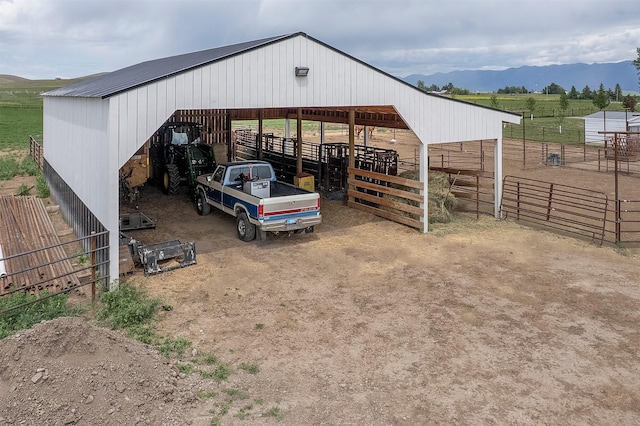 45331 Turnquist Rd, Ronan, MT 59864 - view of outdoor structure featuring a rural view, an exterior structure, and a mountain view