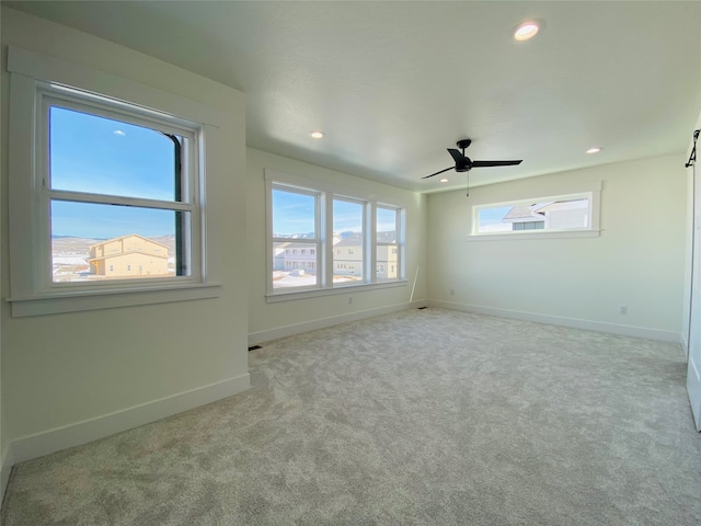 5341A Remington Dr Unit A, Missoula, MT 59808 - empty room with ceiling fan, recessed lighting, carpet floors, and baseboards