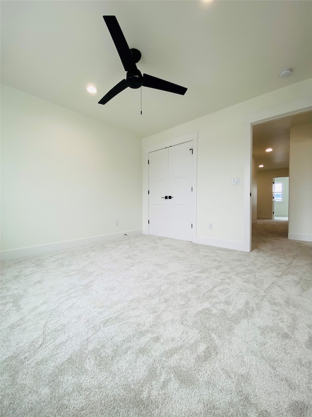 5341A Remington Dr Unit A, Missoula, MT 59808 - unfurnished bedroom featuring carpet, baseboards, recessed lighting, a closet, and a ceiling fan