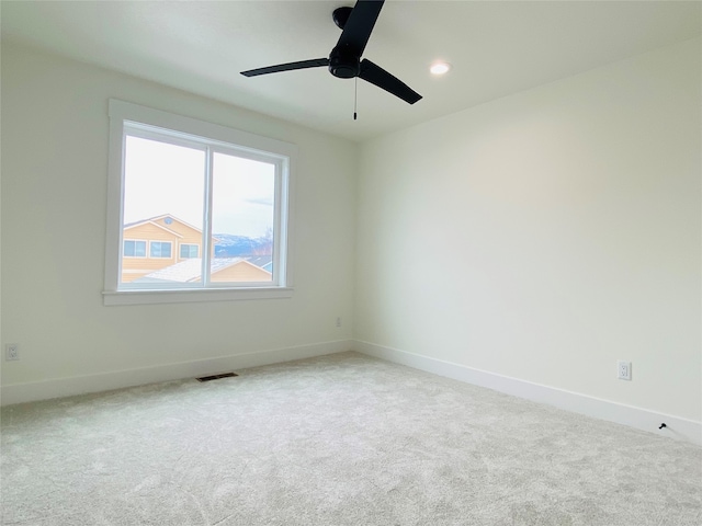 5341A Remington Dr Unit A, Missoula, MT 59808 - carpeted spare room with baseboards, a ceiling fan, and recessed lighting