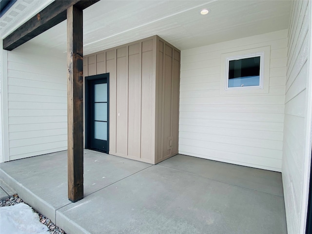 5341A Remington Dr Unit A, Missoula, MT 59808 - doorway to property with a patio and board and batten siding