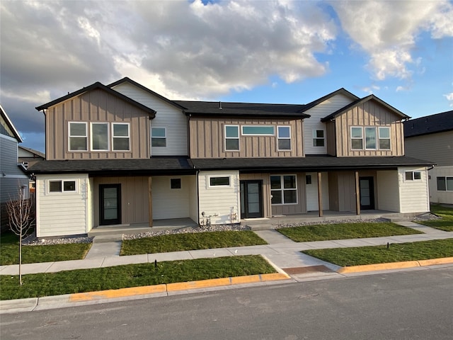 5341A Remington Dr Unit A, Missoula, MT 59808 - townhome / multi-family property featuring covered porch and board and batten siding