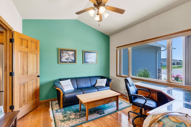 1618 Creekside Dr, Stevensville, MT 59870 - office featuring vaulted ceiling, a ceiling fan, wood finished floors, and baseboards
