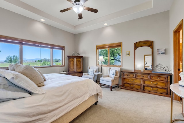 1618 Creekside Dr, Stevensville, MT 59870 - bedroom featuring light carpet, recessed lighting, a ceiling fan, and a raised ceiling