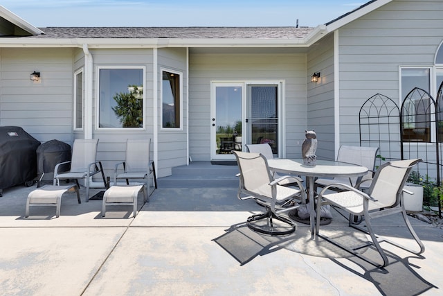 1618 Creekside Dr, Stevensville, MT 59870 - view of patio / terrace featuring outdoor dining area and grilling area