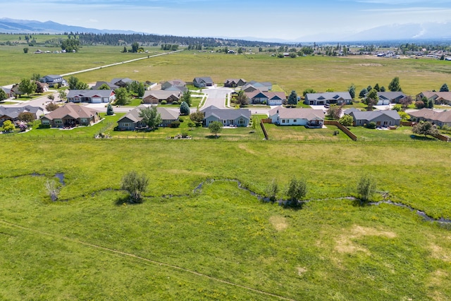 1618 Creekside Dr, Stevensville, MT 59870 - aerial view of residential area featuring a mountainous background