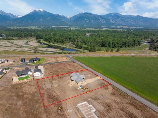 5130 Cameron Rose Ln, Stevensville, MT 59870 - aerial overview of property's location featuring a mountainous background and property parcel outlined