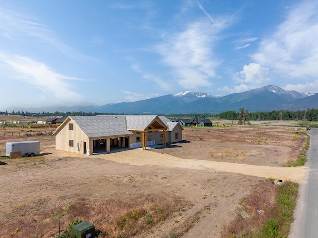5130 Cameron Rose Ln, Stevensville, MT 59870 - view of front of home featuring a mountain view, a view of countryside, and dirt driveway