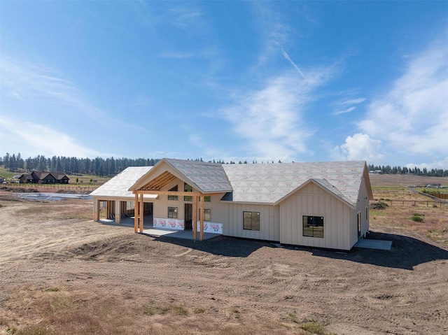5130 Cameron Rose Ln, Stevensville, MT 59870 - view of front of property with board and batten siding and a patio