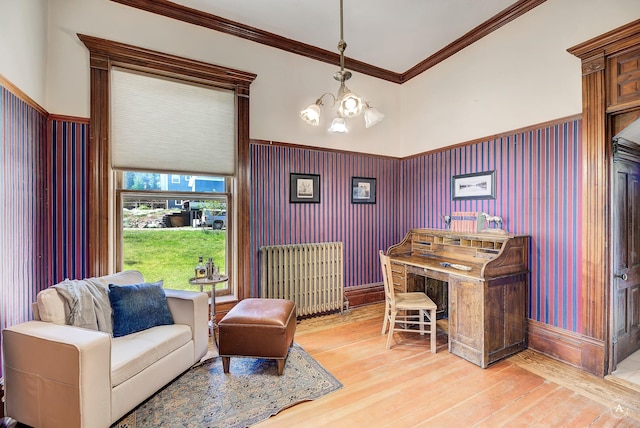 860 Hiawatha St, Helena, MT 59601 - office with radiator heating unit, a chandelier, light wood-type flooring, crown molding, and wainscoting