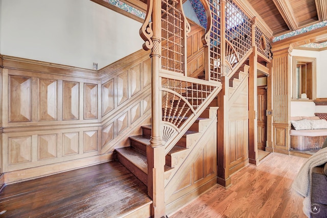 860 Hiawatha St, Helena, MT 59601 - stairs featuring wood finished floors, a decorative wall, and crown molding