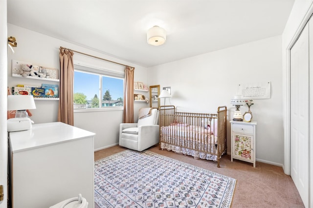 3301 Albany Ave, Butte, MT 59701 - bedroom featuring light colored carpet, a crib, and a closet