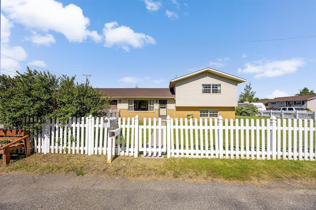 3301 Albany Ave, Butte, MT 59701 - tri-level home featuring brick siding and a fenced front yard