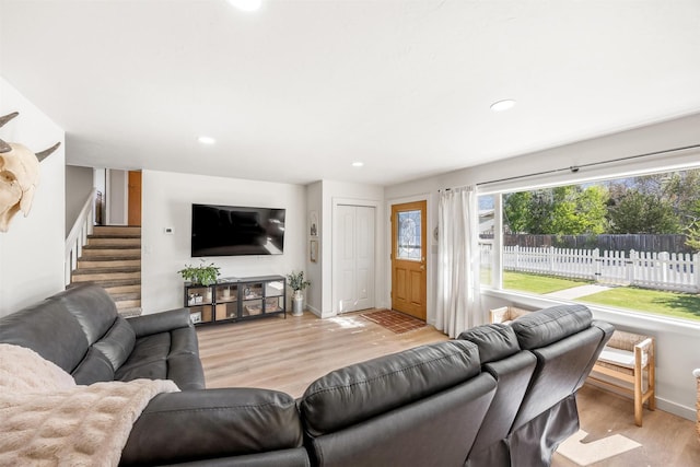 3301 Albany Ave, Butte, MT 59701 - living room featuring light wood-style floors, recessed lighting, and stairway