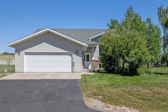 3161 Holmberg Dr, Helena, MT 59602 - view of front of house with asphalt driveway and a garage
