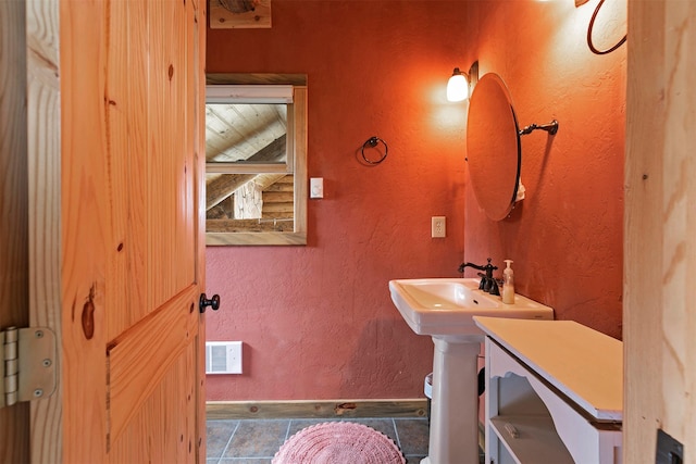 30 Douglas Lee Ln, Anaconda, MT 59711 - bathroom with baseboards and tile patterned flooring