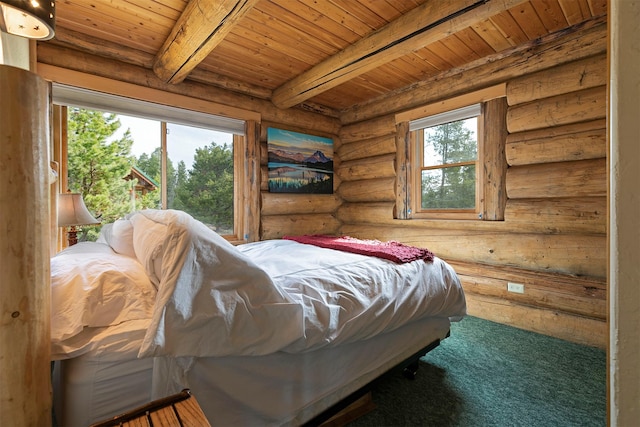 30 Douglas Lee Ln, Anaconda, MT 59711 - carpeted bedroom featuring a wooden ceiling with exposed beams and log walls