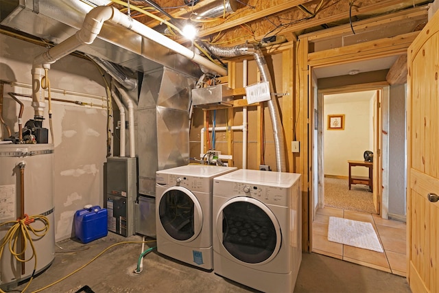 30 Douglas Lee Ln, Anaconda, MT 59711 - washroom featuring water heater and washing machine and dryer