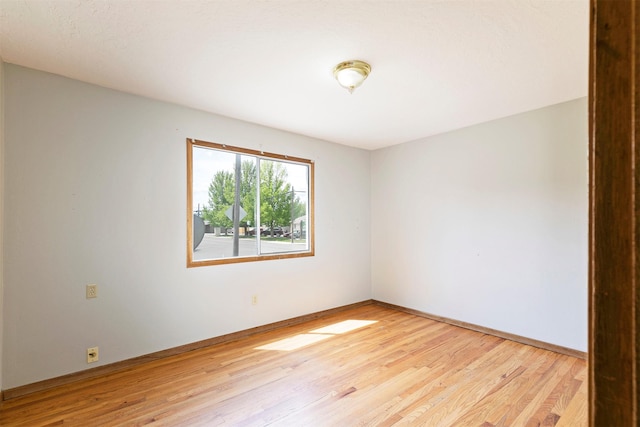 470 Strand Ave, Missoula, MT 59801 - unfurnished room with light wood-style flooring and baseboards