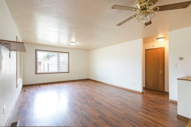 470 Strand Ave, Missoula, MT 59801 - empty room featuring a textured ceiling, wood finished floors, and a ceiling fan