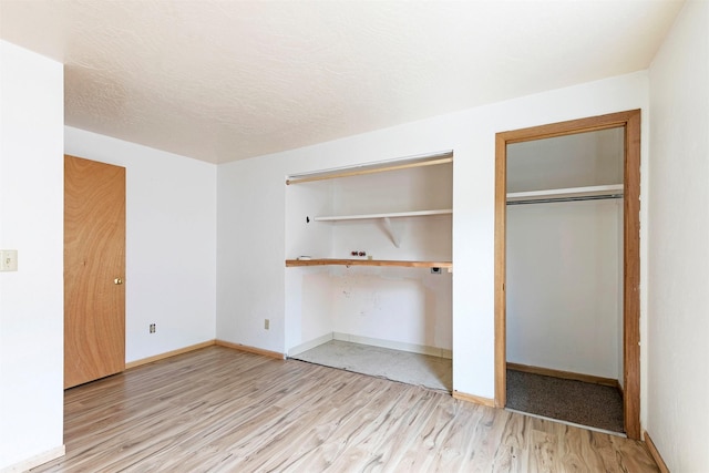 470 Strand Ave, Missoula, MT 59801 - unfurnished bedroom featuring light wood-type flooring and baseboards