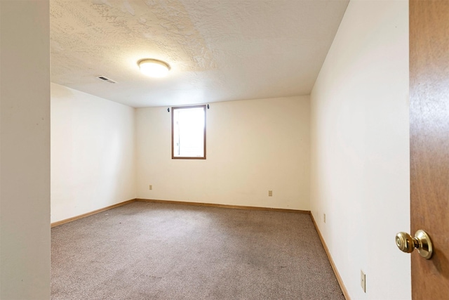 470 Strand Ave, Missoula, MT 59801 - empty room with carpet floors and a textured ceiling