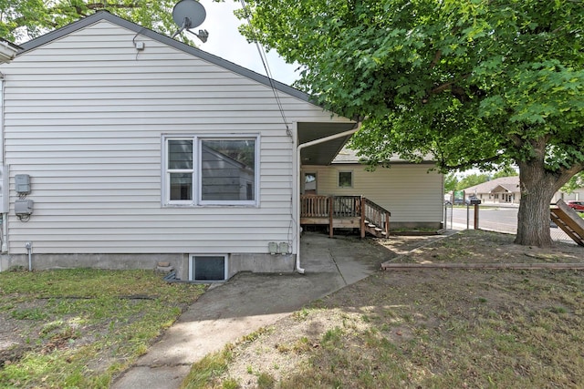 470 Strand Ave, Missoula, MT 59801 - rear view of house featuring a wooden deck and a patio area