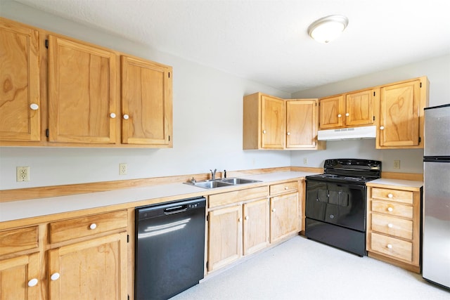 470 Strand Ave, Missoula, MT 59801 - kitchen featuring black appliances, under cabinet range hood, light countertops, and light brown cabinets
