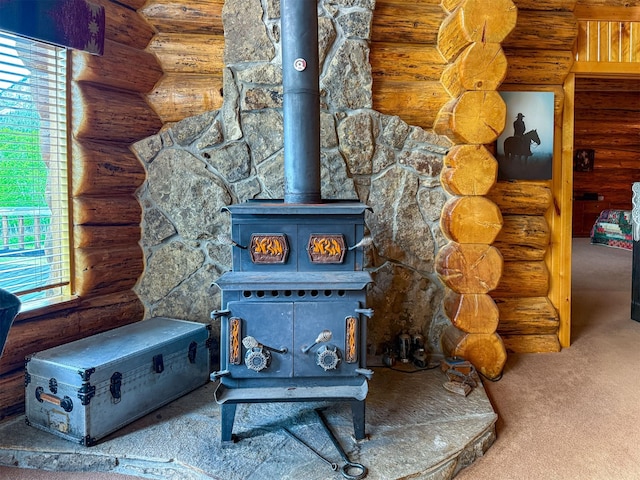 2055 Teton Canyon Rd, Choteau, MT 59422 - detailed view of a wood stove, rustic walls, and carpet flooring