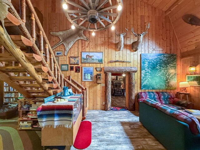 2055 Teton Canyon Rd, Choteau, MT 59422 - living room featuring wooden walls, wood-type flooring, wood ceiling, and high vaulted ceiling