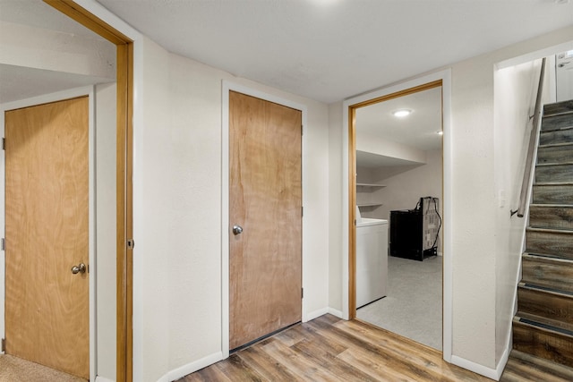 1940 Dixon Ave, Missoula, MT 59801 - corridor with light wood-type flooring, washer / clothes dryer, and stairway