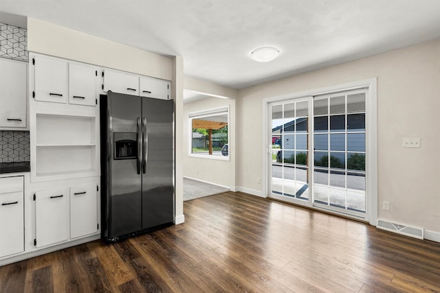 1940 Dixon Ave, Missoula, MT 59801 - kitchen featuring stainless steel refrigerator with ice dispenser, white cabinets, dark wood-style flooring, and dark countertops