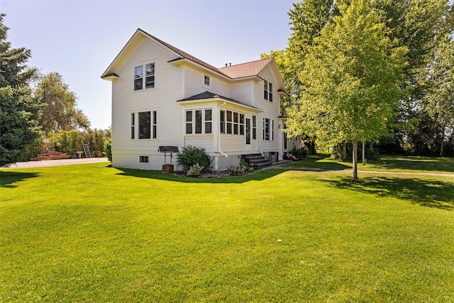 101 Lewis Ln, Hamilton, MT 59840 - rear view of house featuring a lawn and entry steps