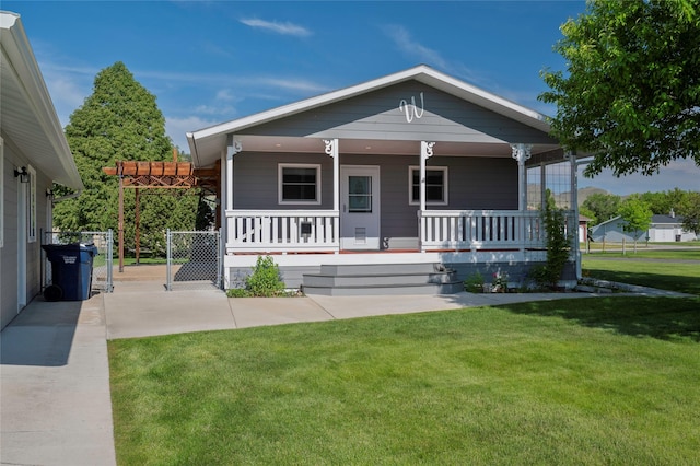 5706 Shannon Ct, Helena, MT 59602 - back of house with a porch and a lawn