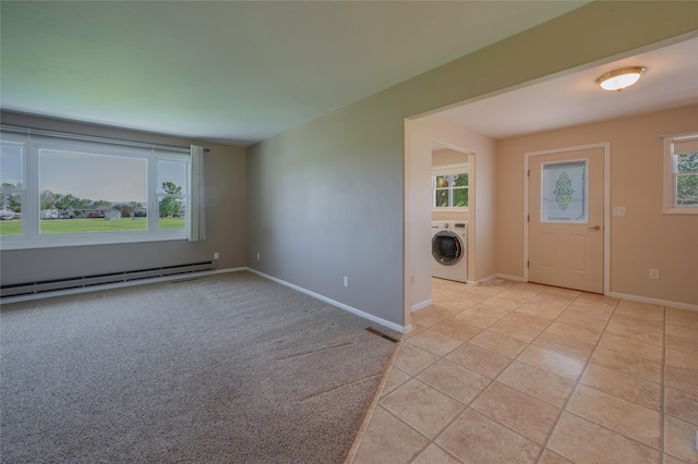 5706 Shannon Ct, Helena, MT 59602 - spare room featuring washer / dryer and baseboard heating