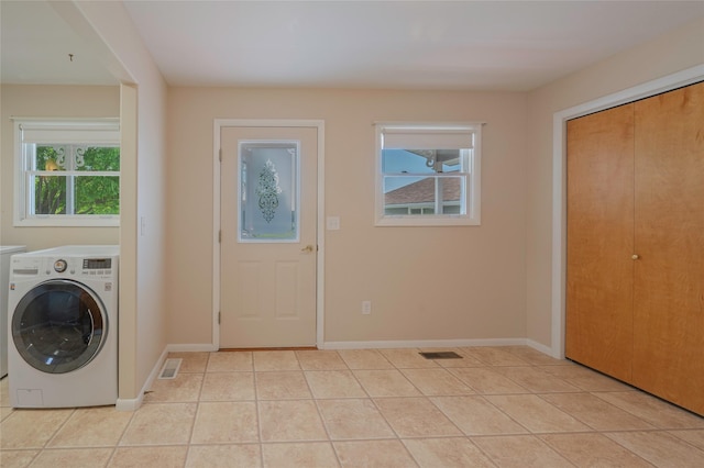 5706 Shannon Ct, Helena, MT 59602 - laundry area featuring washer / dryer and light tile patterned flooring