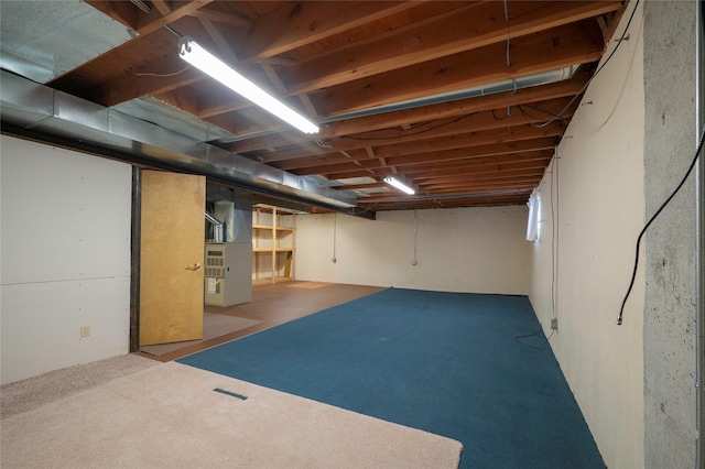 5706 Shannon Ct, Helena, MT 59602 - unfinished basement with heating unit and carpet floors