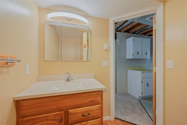5706 Shannon Ct, Helena, MT 59602 - bathroom with vanity and wood finished floors