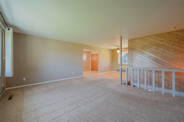 5706 Shannon Ct, Helena, MT 59602 - carpeted empty room featuring a ceiling fan and wood walls