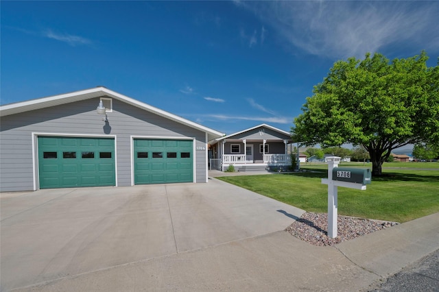 5706 Shannon Ct, Helena, MT 59602 - single story home with covered porch, a front yard, and a garage