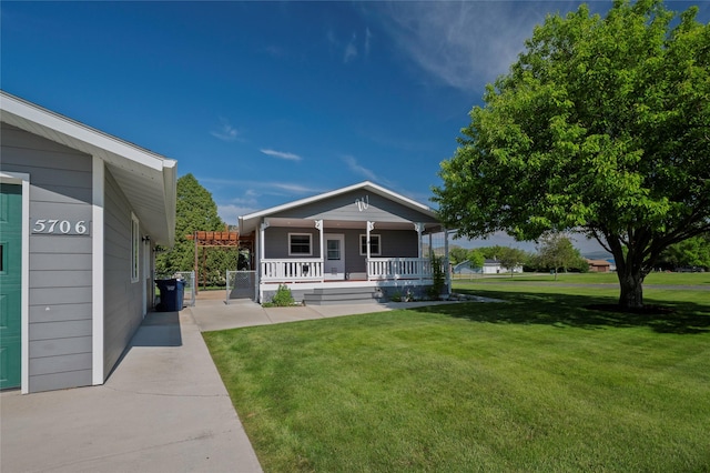 5706 Shannon Ct, Helena, MT 59602 - view of front of house with covered porch and a front lawn