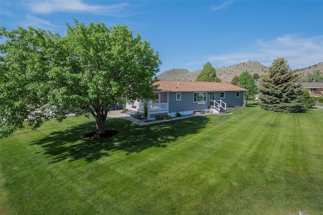 5706 Shannon Ct, Helena, MT 59602 - view of grassy yard with a mountain view