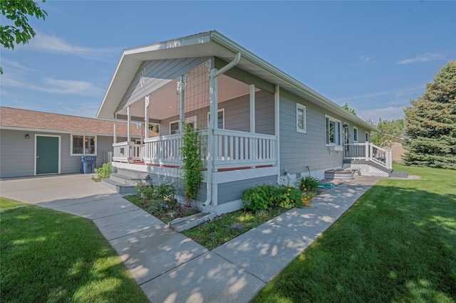 5706 Shannon Ct, Helena, MT 59602 - view of side of property with covered porch and a lawn