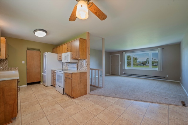 5706 Shannon Ct, Helena, MT 59602 - kitchen featuring white appliances, a baseboard heating unit, light colored carpet, backsplash, and light tile patterned floors