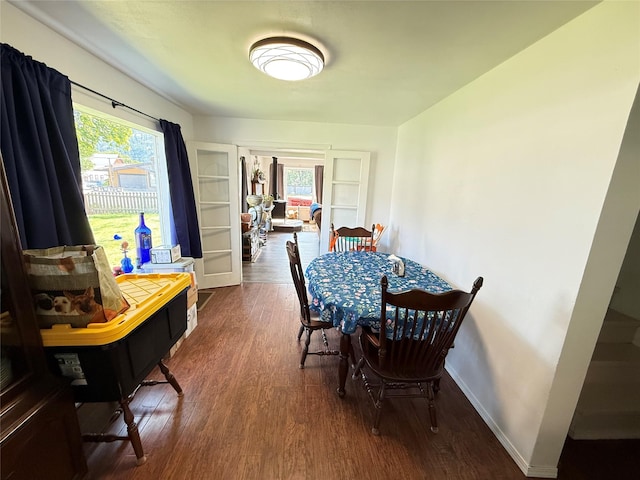 306 E Missoula Ave, Troy, MT 59935 - dining room with wood finished floors and healthy amount of natural light
